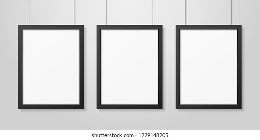 Three Vector Realistic Modern Interior Black Blank Vertical A4 Wooden Poster Picture Frame Set Hanging on the Ropes on White Wall Mock-up. Empty Poster Frames Design Template for Mockup, Presentation