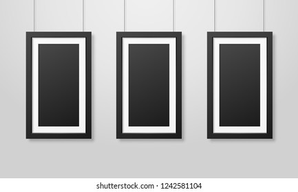 Three Vector Realistic Modern Interior Black Blank Wooden Poster Picture Frame Set Hanging on the Ropes on White Wall Mock-up. Empty Poster Frames Design Template for Mockup, Presentation