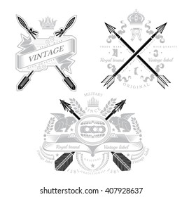 Three vintage heraldic element with cross arrows and decorative elements