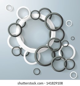 Three white and black rings with shadows on the grey background. Eps 10 vector file.