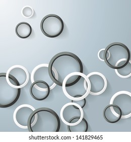 Three white and black rings with shadows on the grey background. Eps 10 vector file.