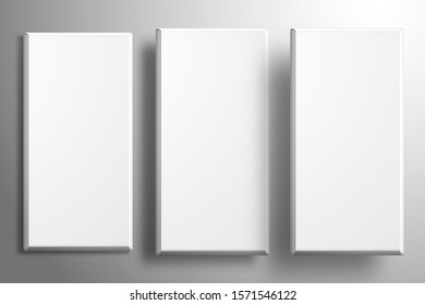 Three white empty chocolate packaging is at different heights above the surface. Realistic vector template for design