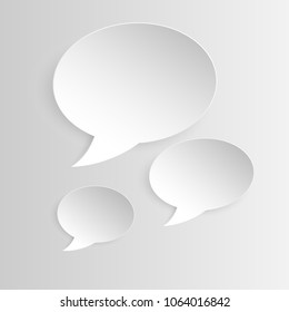 three white paper bubble for speech on gray background