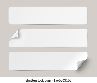 Three white realistic paper adhesive stickers with curved corner on transparent background.