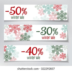 Three winter sales banners with snowflakes
