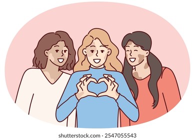 Tres mujeres con síndrome de vitiligo sonríen y muestran gestos con el corazón como señal de amor propio. Las amigas felicitan el día del vitiligo pidiendo tolerancia a las personas con despigmentación de la piel