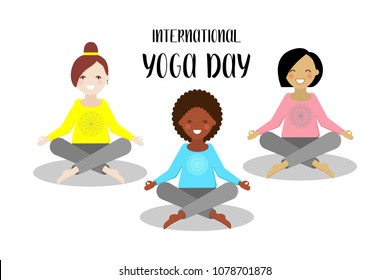 Three young girls sitting in a lotus pose. International yoga day. 