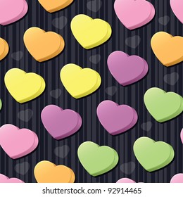 Three-dimensional conversation hearts in pink, purple, green, yellow and orange arranged on a black striped seamless tile; add your own messages (vector contains clipping mask.)
