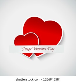 Three-dimensional red heart shape with valentine's day text happy with a white background