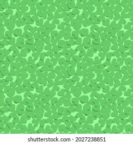 Three-leaf clover seamless pattern with dew drops on a light green background.