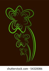 Three-leaf clovers over brown background