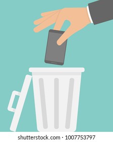 Throwing Away A Smartphone Concept. Hand Putting Phone Into The Trash