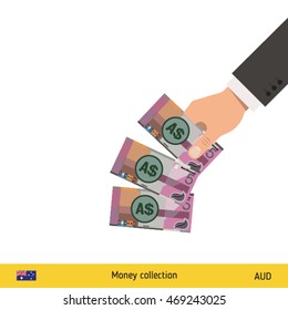 Throwing three australian dollar. Australian dollar banknote.