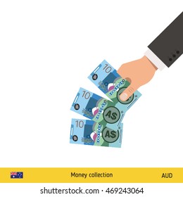 Throwing three australian dollar. Australian dollar banknote.