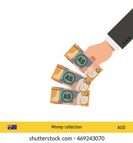 Throwing three australian dollar. Australian dollar banknote.