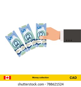 Throwing three Canadian dollar. Canadian dollar banknote.