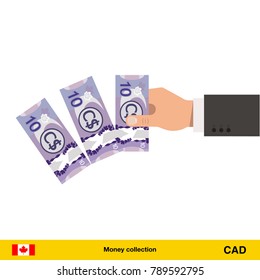 Throwing three Canadian dollar. Canadian dollar banknote.