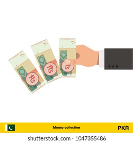 
Throwing three Pakistan rupee. Pakistan rupee banknote.

