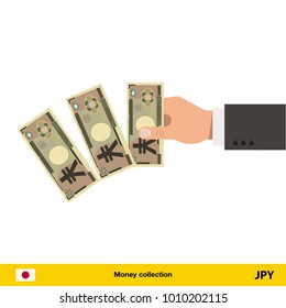 Throwing three Yen. Yen banknote.