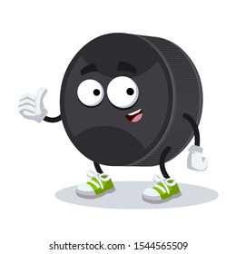 thumbs up cartoon black rubber hockey puck character mascot smiling on white background