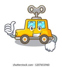 Thumbs up cartoon clockwork toy car in table