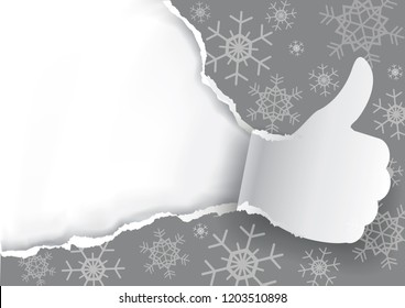 Thumbs up with Christmas torn paper background. 
Paper silhouette of Thumbs up ripping grey Christmas wrapping paper with snowflakes. Place for your text or image. Vector available.