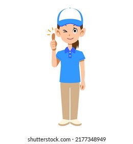 Thumbs up of a female staff member wearing a short-sleeved polo shirt and a hat