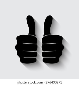 thumbs up icon  on a grey background