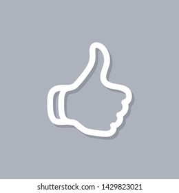 Thumbs up isolated on gray background