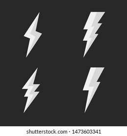 Thunderbolt, lightning strike icons. Set of 4 Bolt lighting icons isolated on black background. Vector illustration