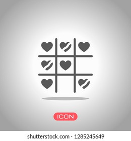 Tic tac toe game, love version with heart, valentine day icon. Icon under spotlight. Gray background
