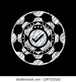 tick icon drawn on blackboard