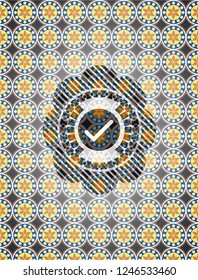 tick icon inside arabesque badge. arabic decoration.