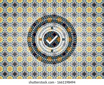tick icon inside arabesque style badge. arabic decoration.