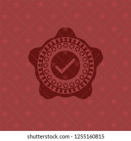tick icon inside badge with red background