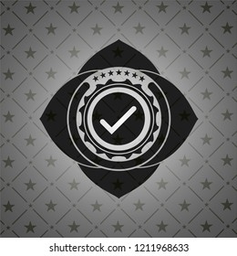 tick icon inside black badge
