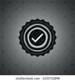tick icon inside black badge