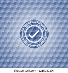 tick icon inside blue badge with geometric pattern.