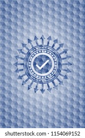 tick icon inside blue emblem with geometric pattern background.