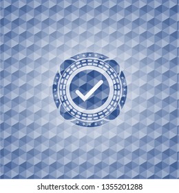 tick icon inside blue emblem with geometric pattern.