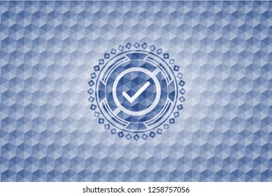 tick icon inside blue polygonal emblem.