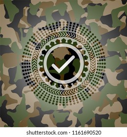 tick icon inside camo emblem
