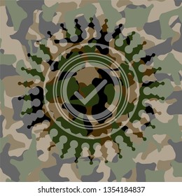 tick icon inside camo emblem