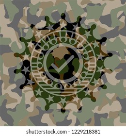 tick icon inside camo texture