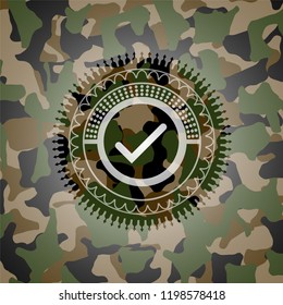 tick icon inside camouflage texture