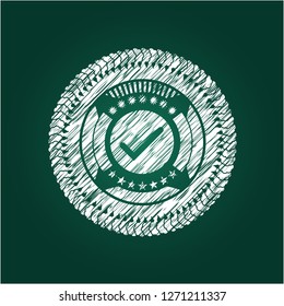 tick icon inside chalkboard emblem
