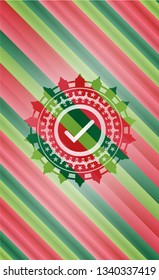tick icon inside christmas badge.