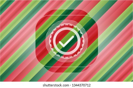 tick icon inside christmas colors badge.