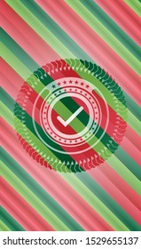 tick icon inside christmas style badge..