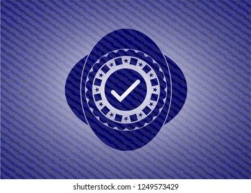 tick icon inside emblem with jean high quality background